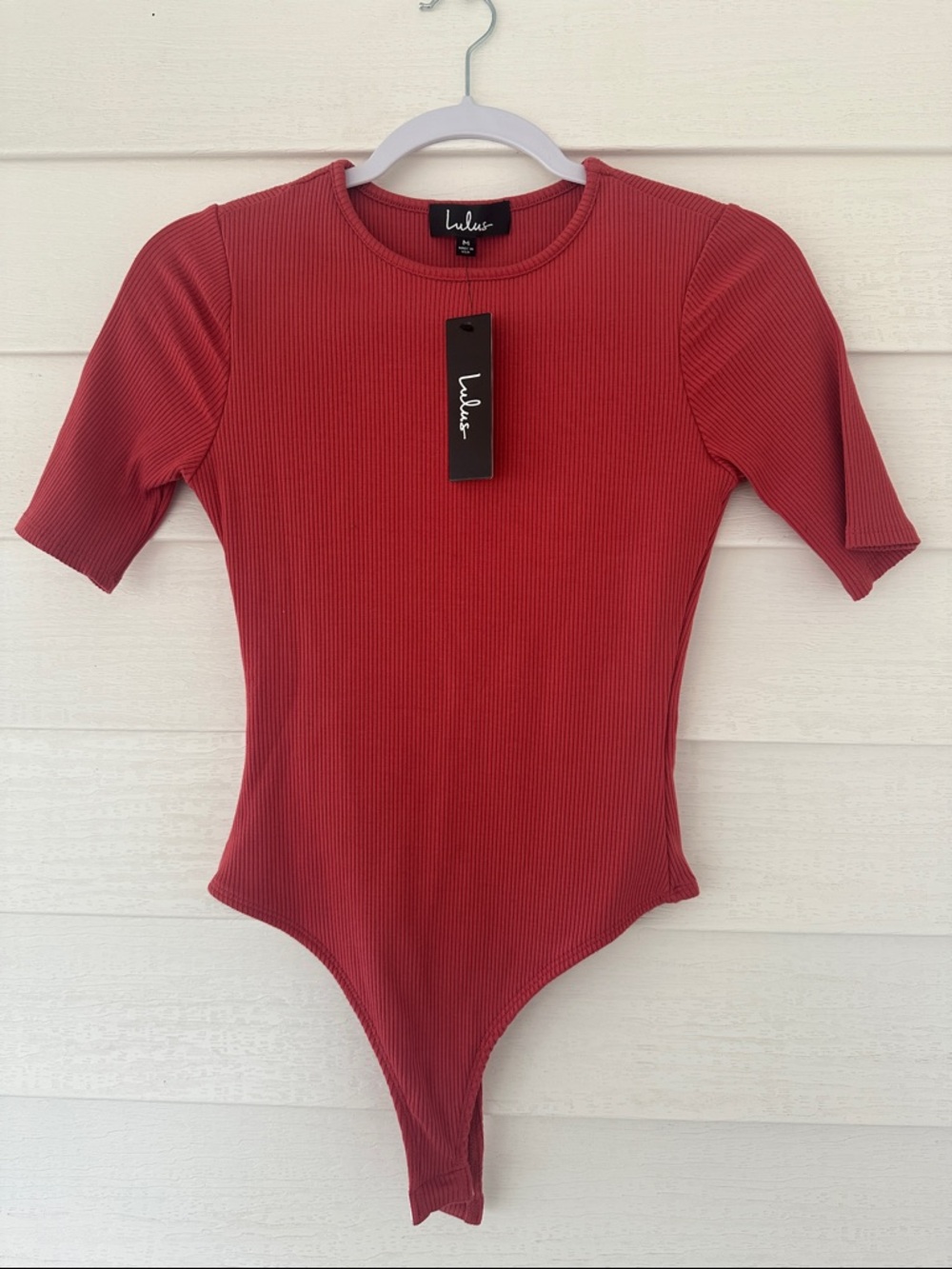 Lulu's Kids Ribbed Brick Red Short-Sleeve One-Piece Bodysuit